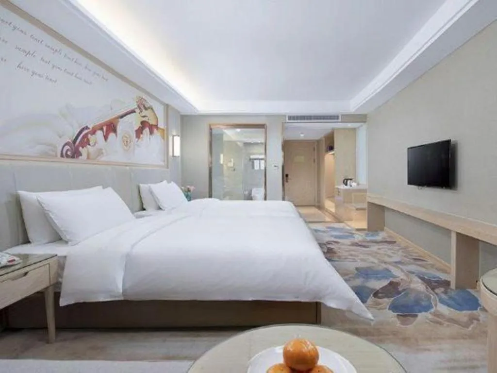 Bed in Vienna Hotel Tianjin Huaming