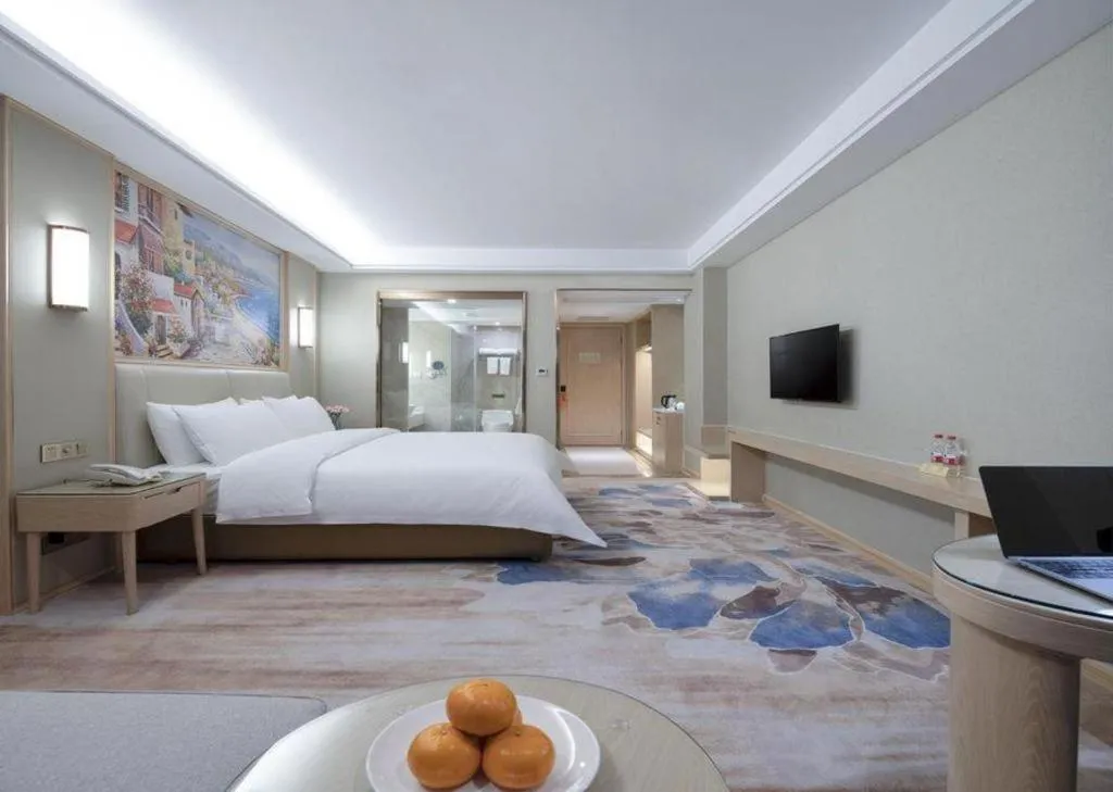 Bed in Vienna Hotel Tianjin Huaming