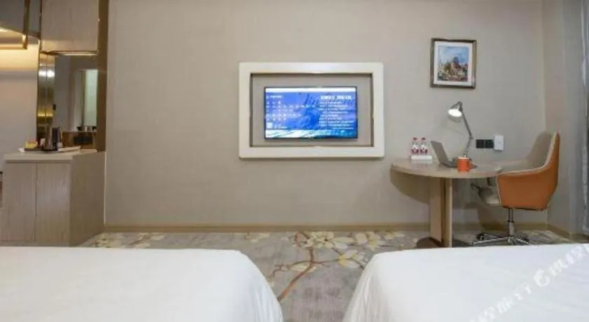 Bed in Vienna Hotel Tianjin Huaming