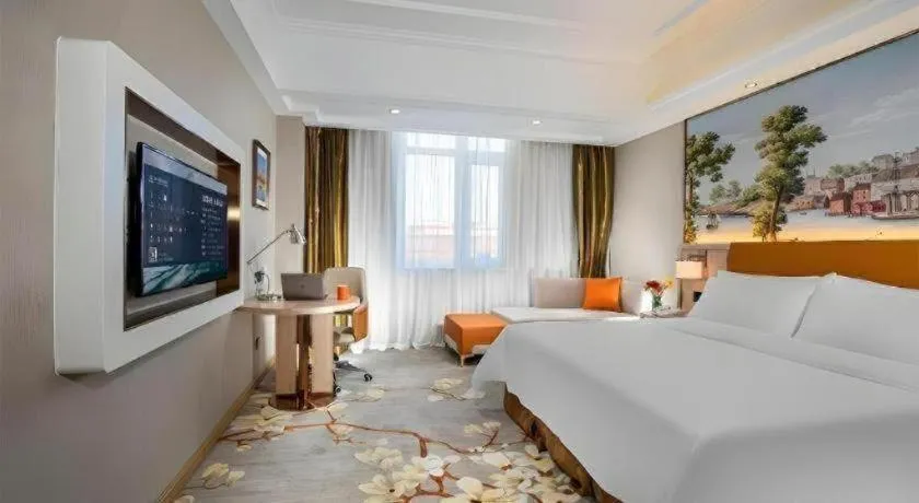 Bed in Vienna Hotel Tianjin Huaming