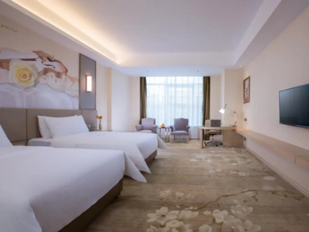 Bed in Vienna Hotel Tianjin Huaming