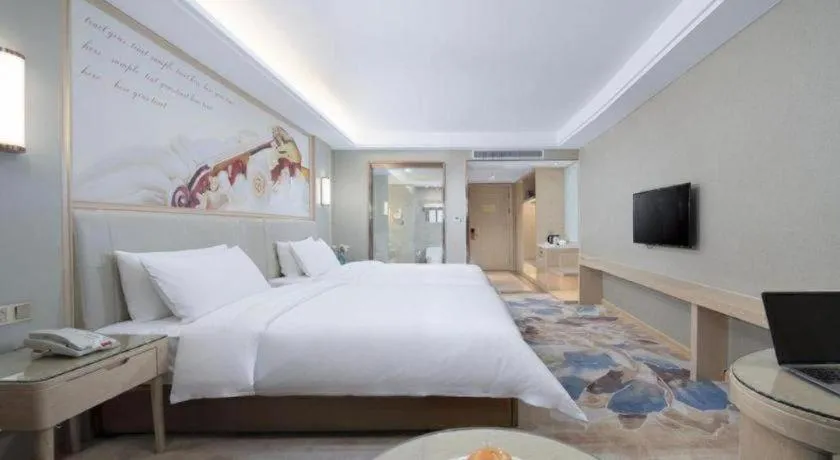 Bed in Vienna Hotel Tianjin Huaming