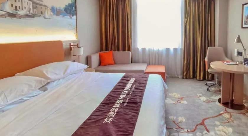 Bed in Vienna Hotel Tianjin Huaming