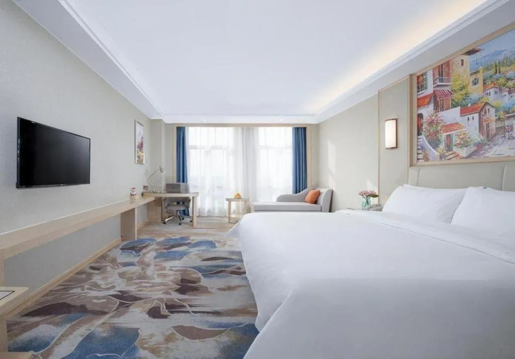 Bed in Vienna Hotel Tianjin Huaming