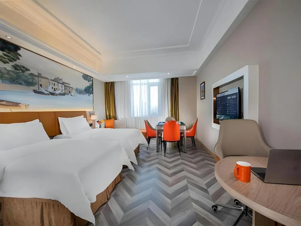 Bed in Vienna Hotel Tianjin Huaming