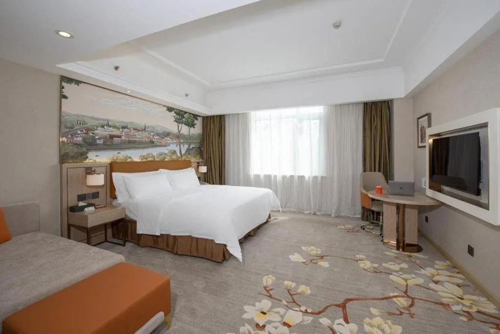 Bed in Vienna Hotel Tianjin Huaming