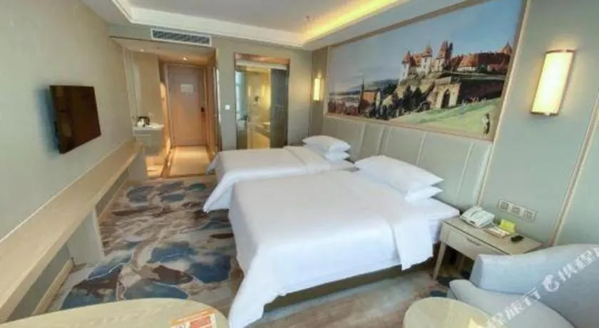 Bed in Vienna Hotel Tianjin Huaming