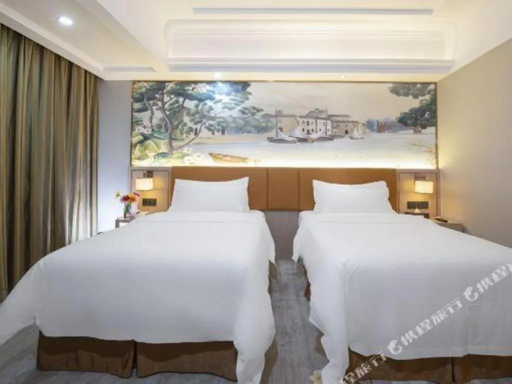 Bed in Vienna Hotel Tianjin Huaming