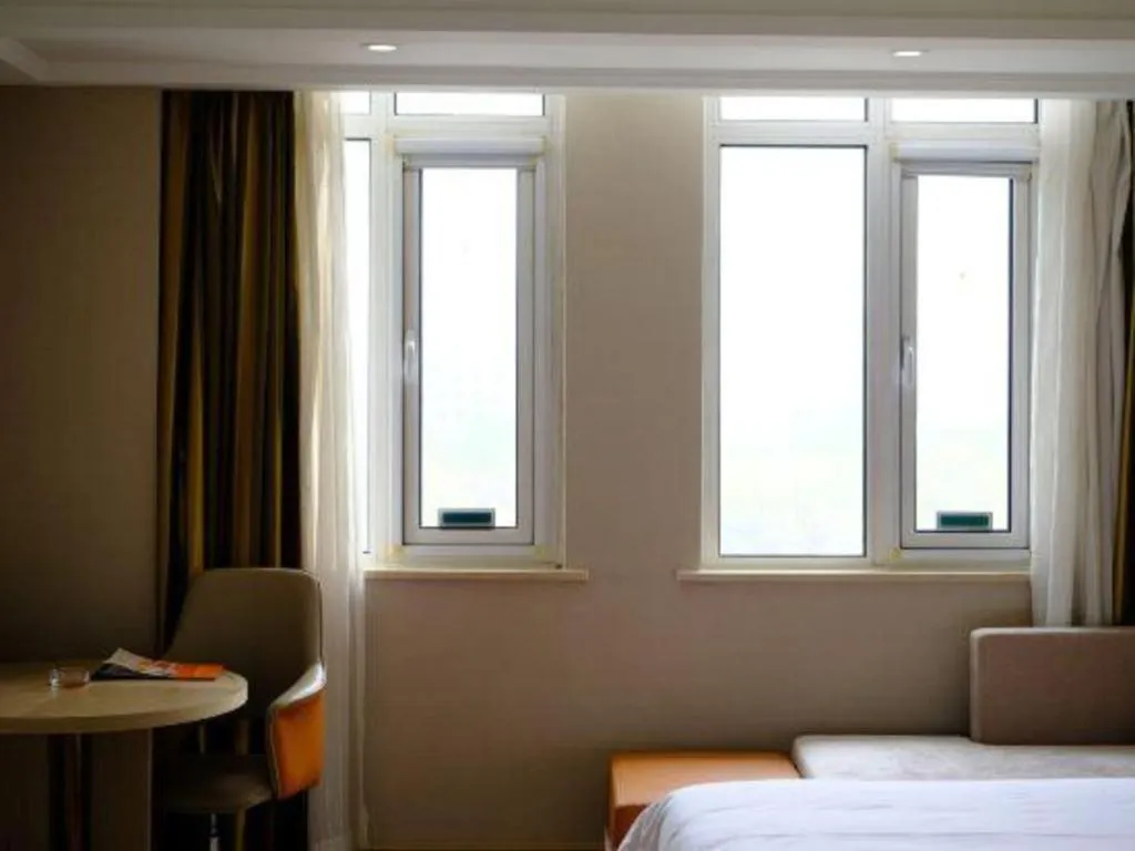 Bed in Vienna Hotel Tianjin Huaming