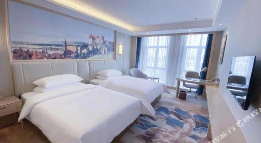 Bed in Vienna Hotel Tianjin Huaming