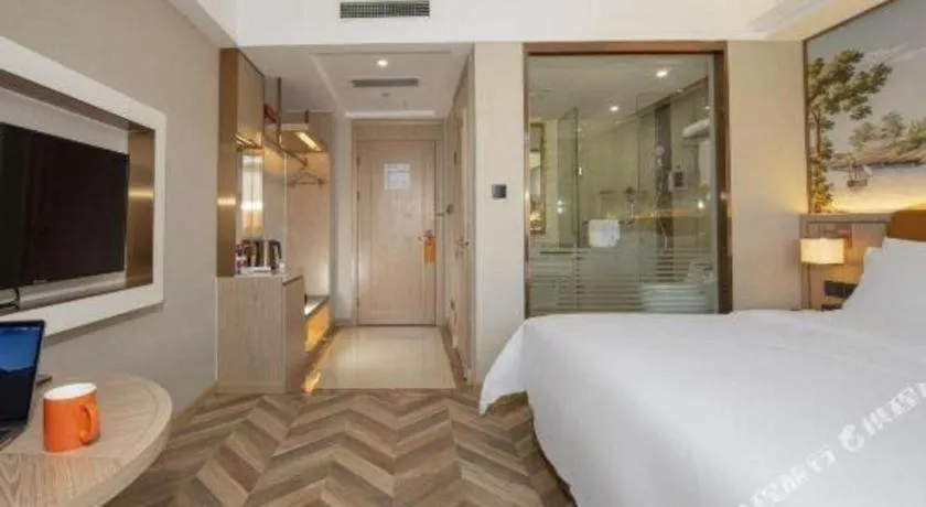 Bed in Vienna Hotel Tianjin Huaming