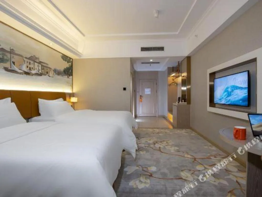 Bed in Vienna Hotel Tianjin Huaming