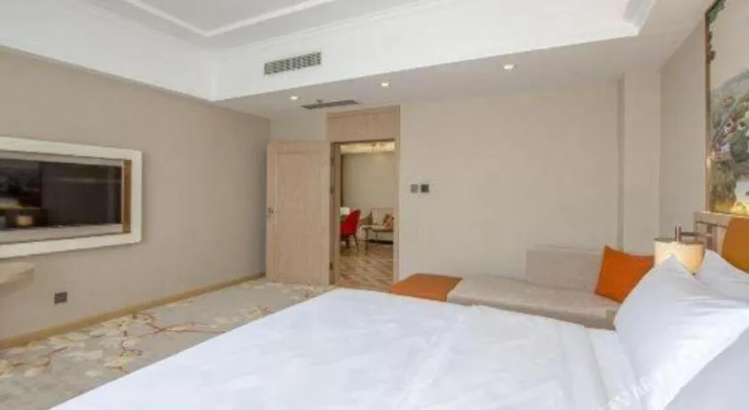 Bed in Vienna Hotel Tianjin Huaming