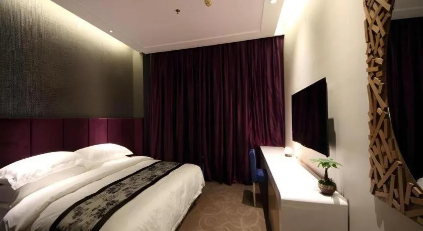 Bed in Harbin Ju Jian Hotel