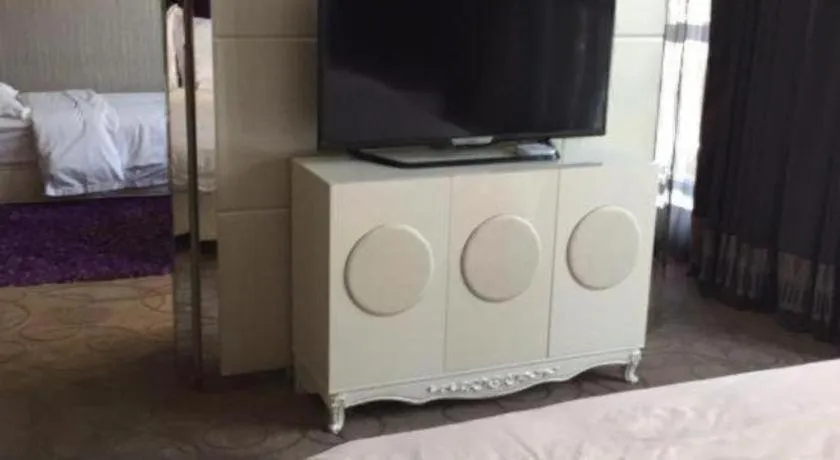 Bed in Harbin Ju Jian Hotel