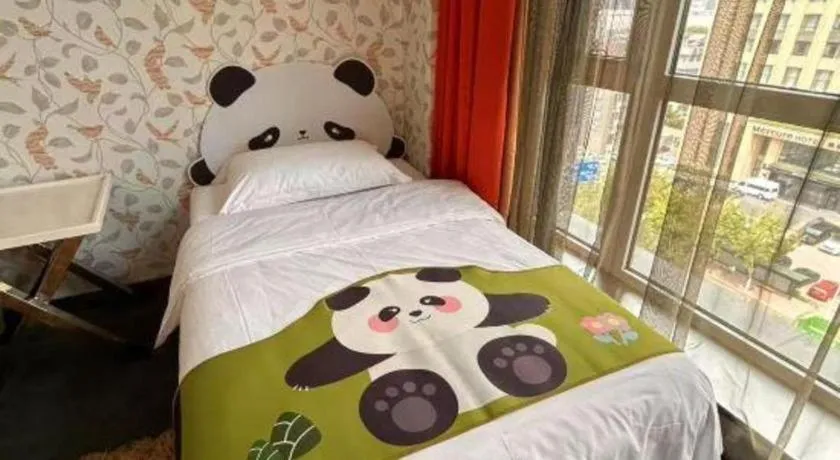 Bed in Harbin Ju Jian Hotel