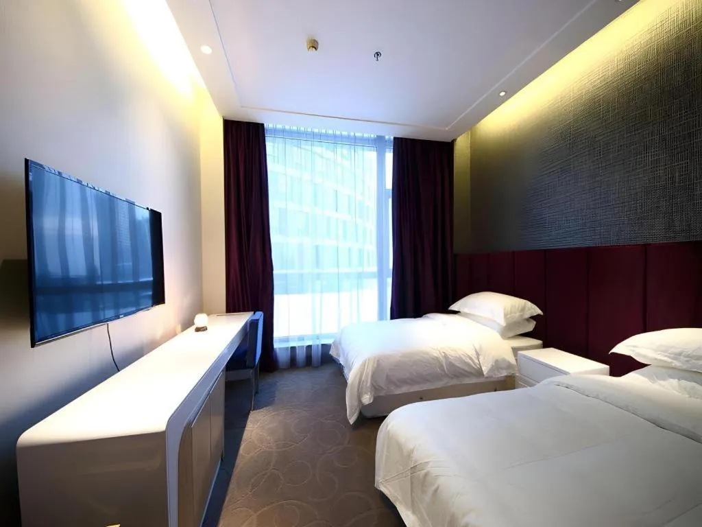 Bed in Harbin Ju Jian Hotel