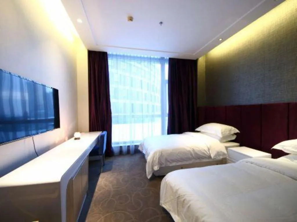 Bed in Harbin Ju Jian Hotel