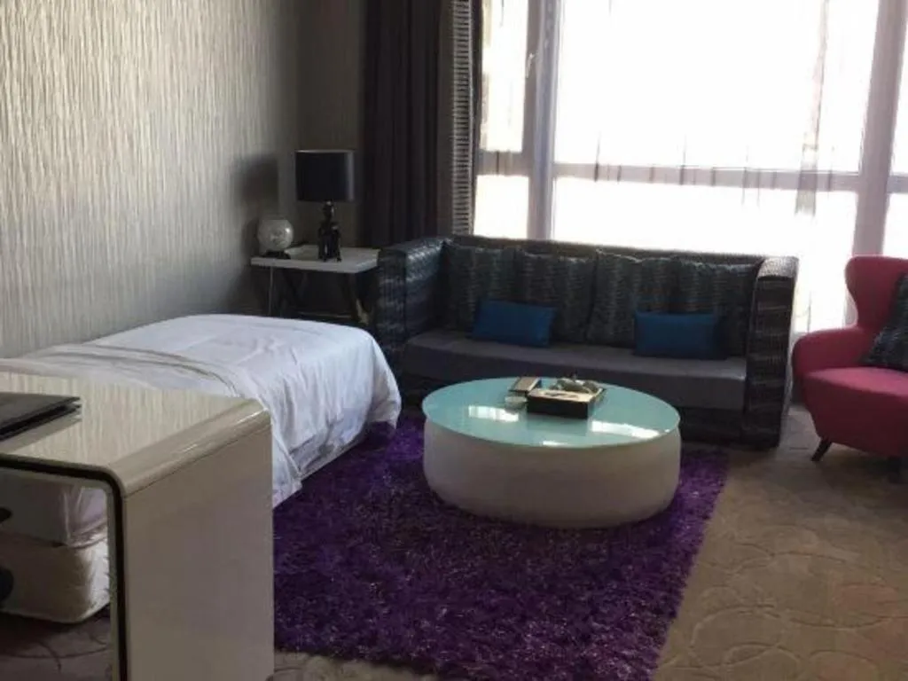 Bed in Harbin Ju Jian Hotel