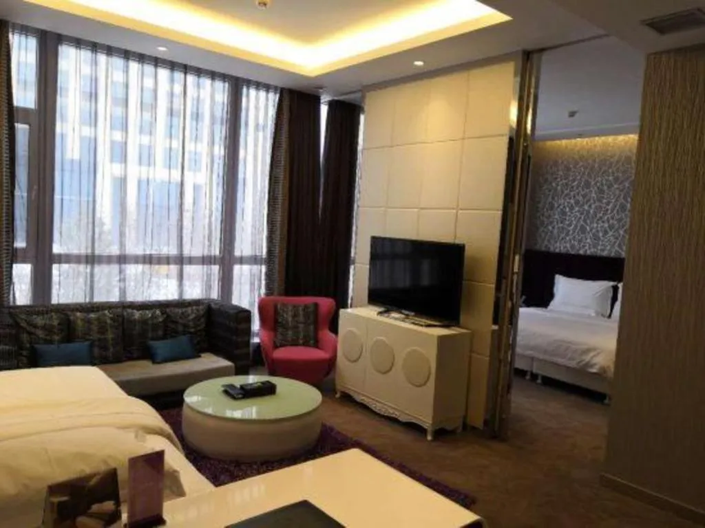 Bed in Harbin Ju Jian Hotel