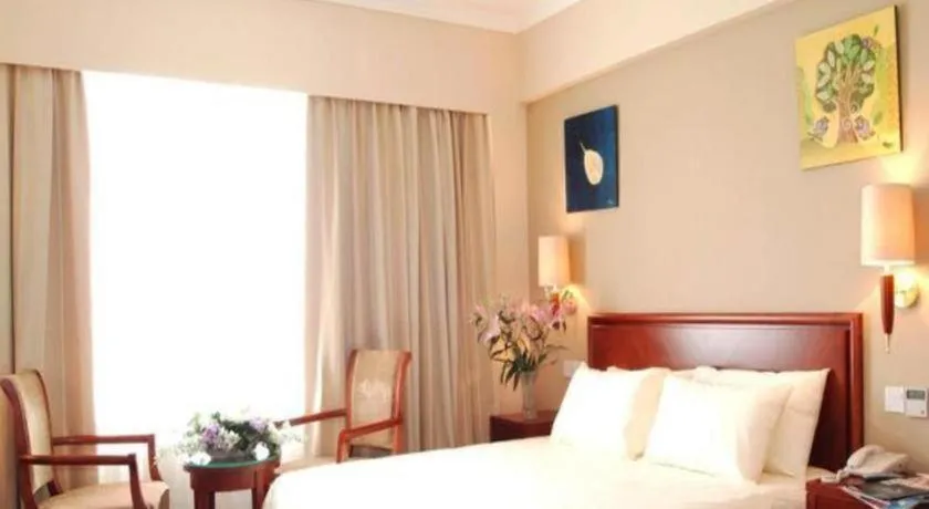 Bed in GreenTree Inn Beijing Daxing Xingye Street Liyuan Business Hotel