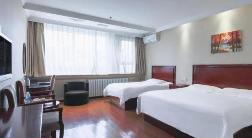 Bed in GreenTree Inn Beijing Daxing Xingye Street Liyuan Business Hotel