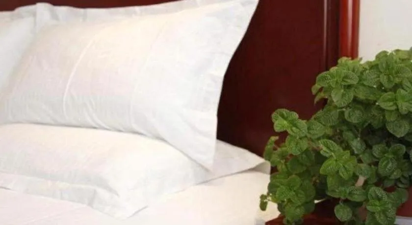 Bed in GreenTree Inn Beijing Daxing Xingye Street Liyuan Business Hotel