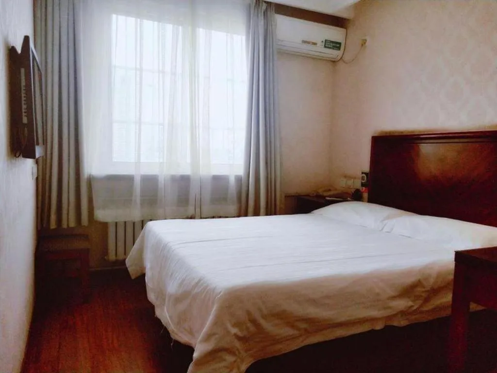 Bed in GreenTree Inn Beijing Daxing Xingye Street Liyuan Business Hotel