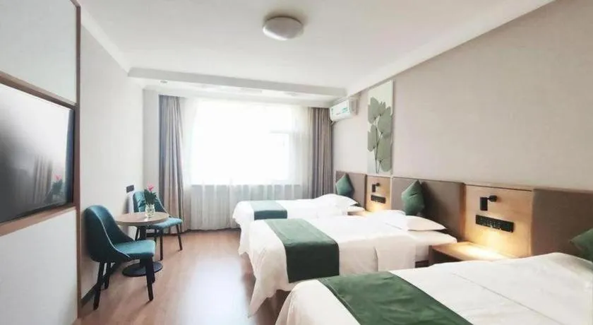 Bed in GreenTree Inn Beijing Daxing Xingye Street Liyuan Business Hotel