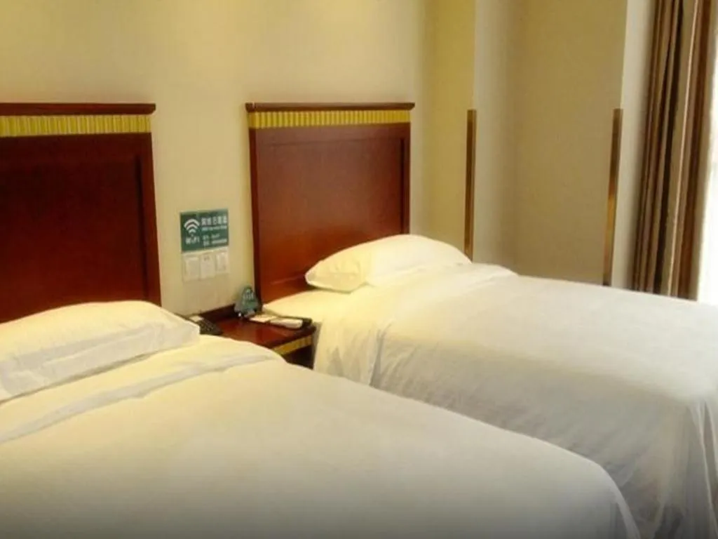 Bed in GreenTree Inn Beijing Daxing Xingye Street Liyuan Business Hotel