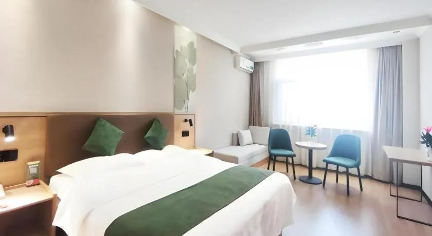 Bed in GreenTree Inn Beijing Daxing Xingye Street Liyuan Business Hotel