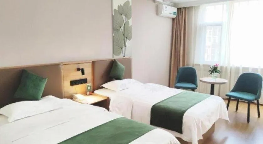 Bed in GreenTree Inn Beijing Daxing Xingye Street Liyuan Business Hotel
