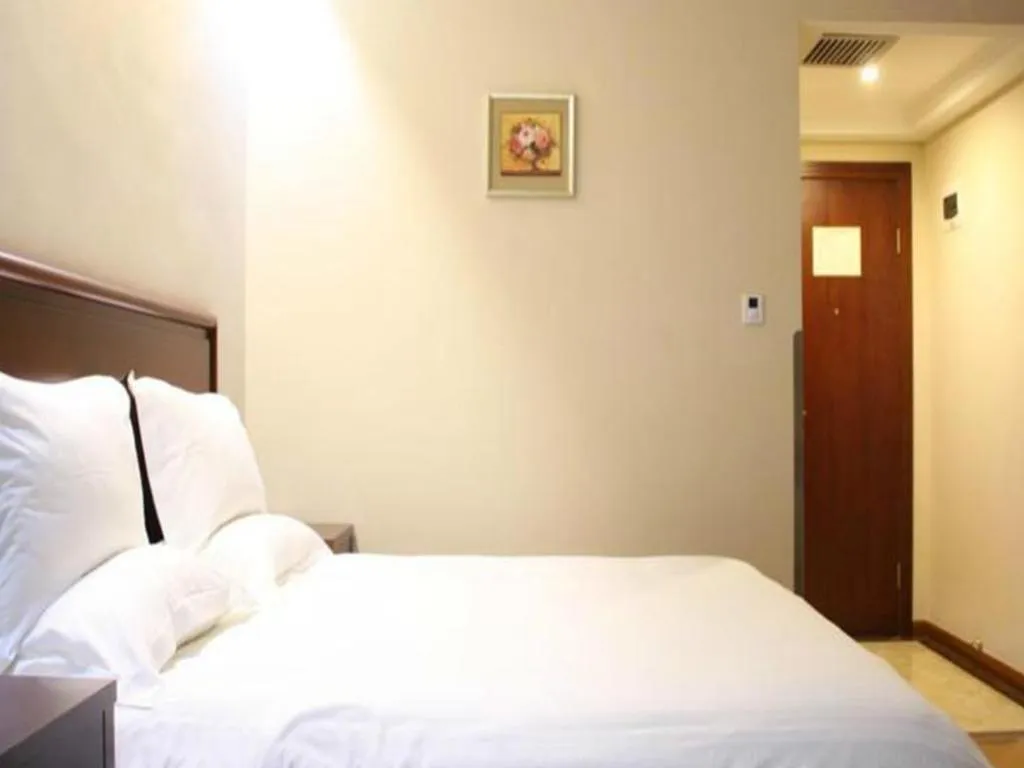 Bed in GreenTree Inn Beijing Daxing Xingye Street Liyuan Business Hotel