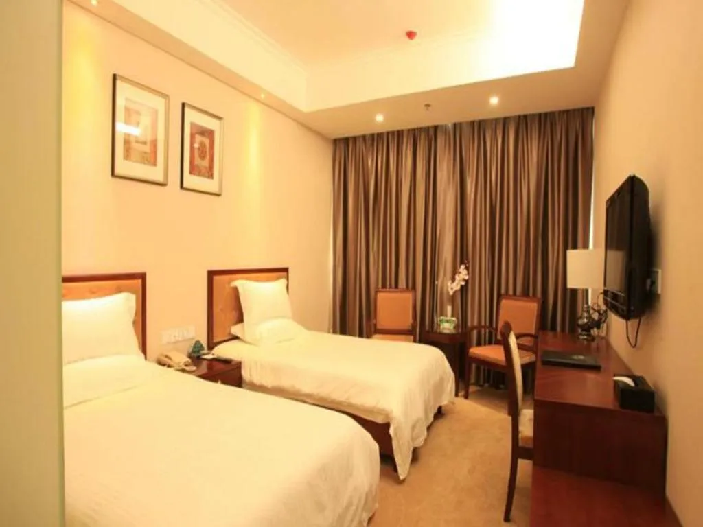Bed in GreenTree Inn Beijing Daxing Xingye Street Liyuan Business Hotel