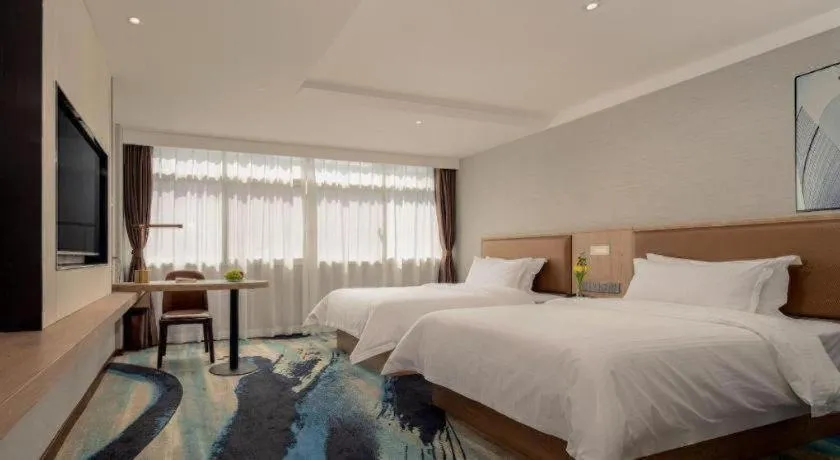 Bed in GreenTree Inn Ganzhou Sankang Temple DaRunFa Express Hotel