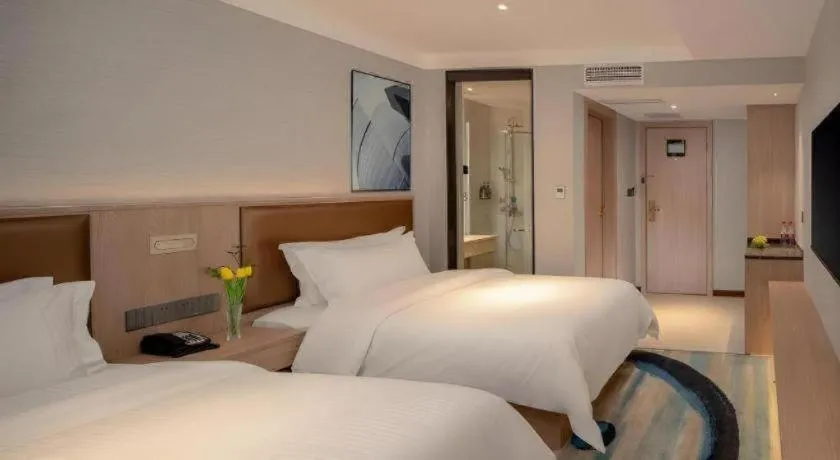 Bed in GreenTree Inn Ganzhou Sankang Temple DaRunFa Express Hotel