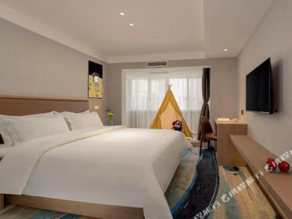 Bed in GreenTree Inn Ganzhou Sankang Temple DaRunFa Express Hotel