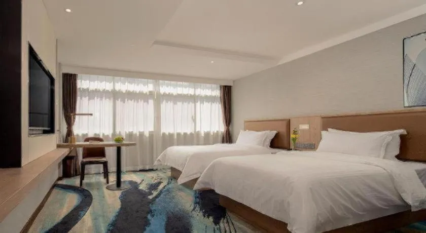 Bed in GreenTree Inn Ganzhou Sankang Temple DaRunFa Express Hotel