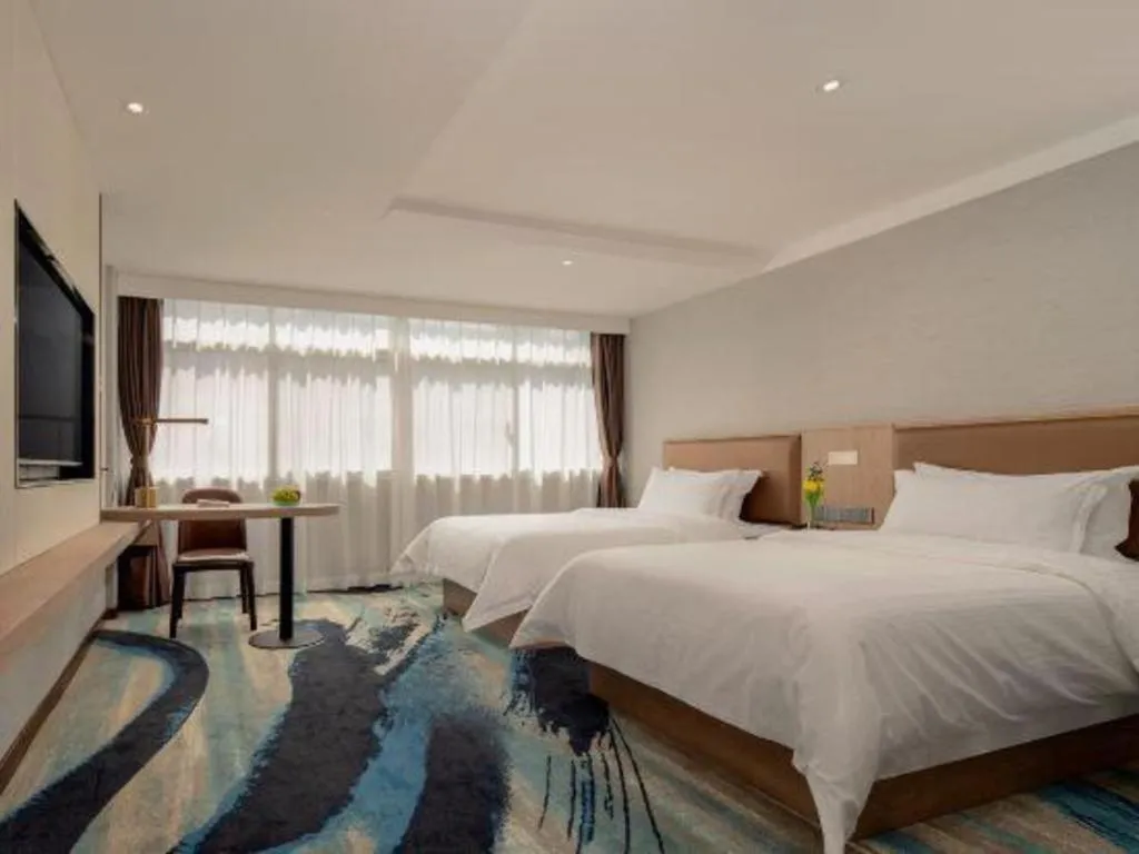 Bed in GreenTree Inn Ganzhou Sankang Temple DaRunFa Express Hotel