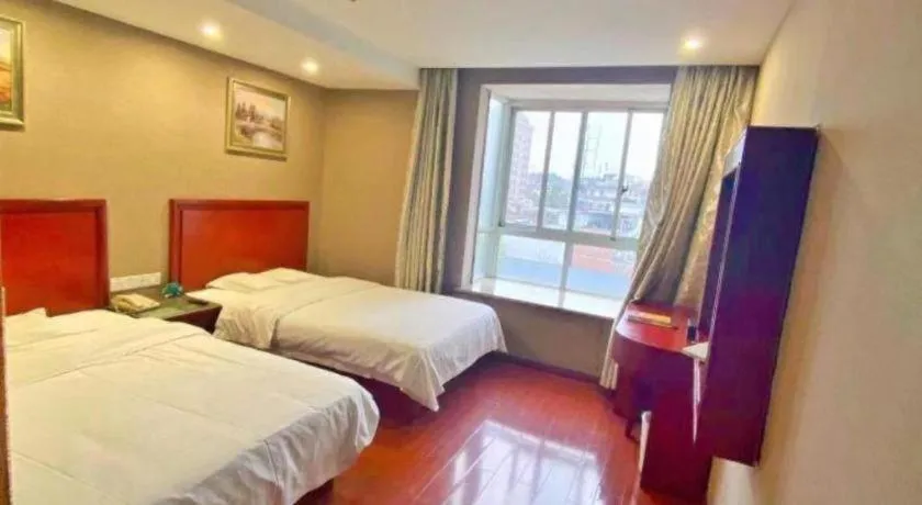 Bed in GreenTree Inn Ganzhou Sankang Temple DaRunFa Express Hotel