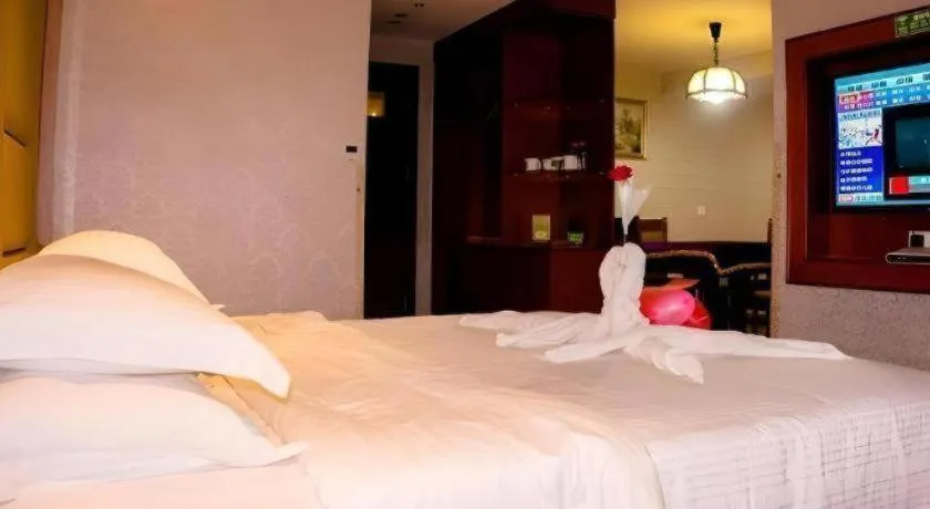 Bed in GreenTree Inn Ganzhou Sankang Temple DaRunFa Express Hotel