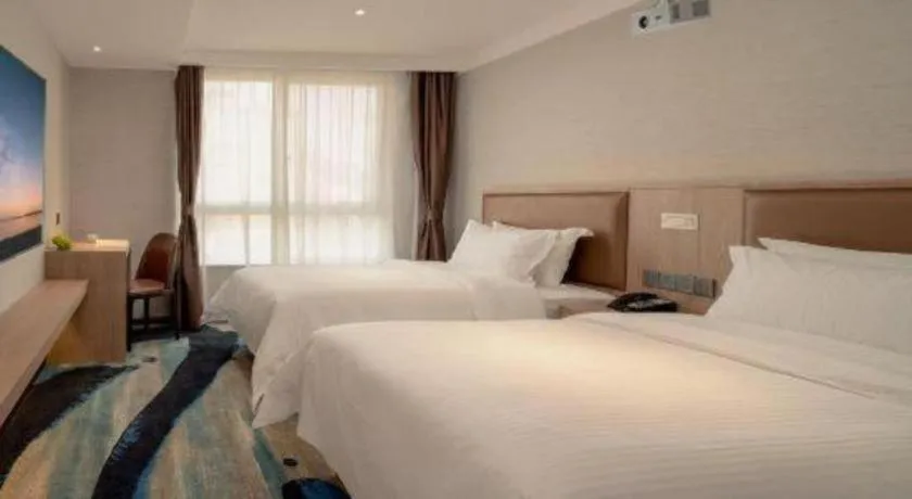 Bed in GreenTree Inn Ganzhou Sankang Temple DaRunFa Express Hotel