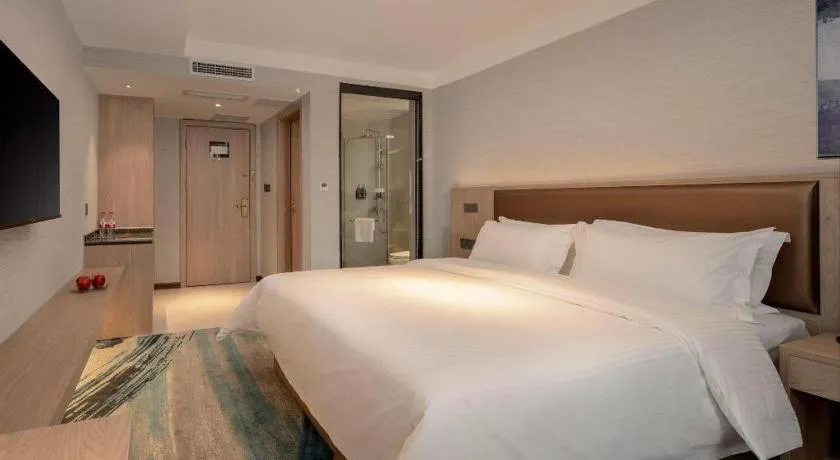 Bed in GreenTree Inn Ganzhou Sankang Temple DaRunFa Express Hotel