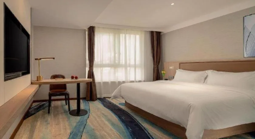 Bed in GreenTree Inn Ganzhou Sankang Temple DaRunFa Express Hotel