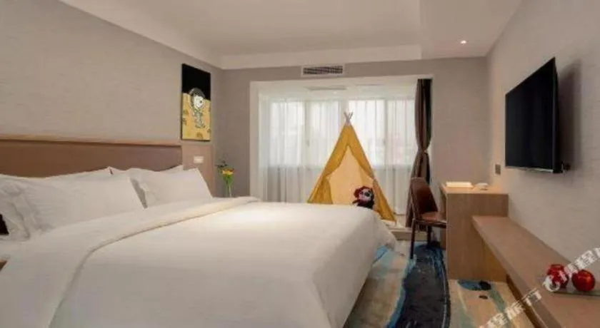 Bed in GreenTree Inn Ganzhou Sankang Temple DaRunFa Express Hotel