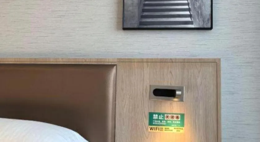 Bed in GreenTree Inn Ganzhou Sankang Temple DaRunFa Express Hotel