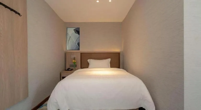 Bed in GreenTree Inn Ganzhou Sankang Temple DaRunFa Express Hotel