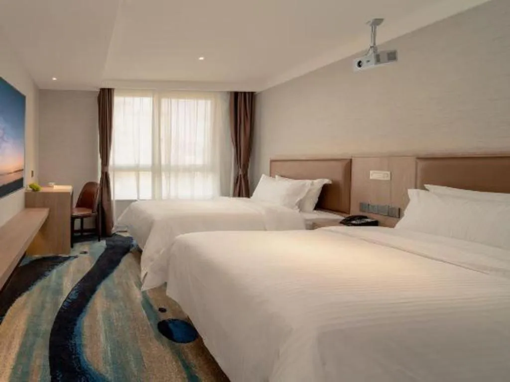 Bed in GreenTree Inn Ganzhou Sankang Temple DaRunFa Express Hotel