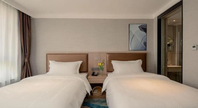 Bed in GreenTree Inn Ganzhou Sankang Temple DaRunFa Express Hotel