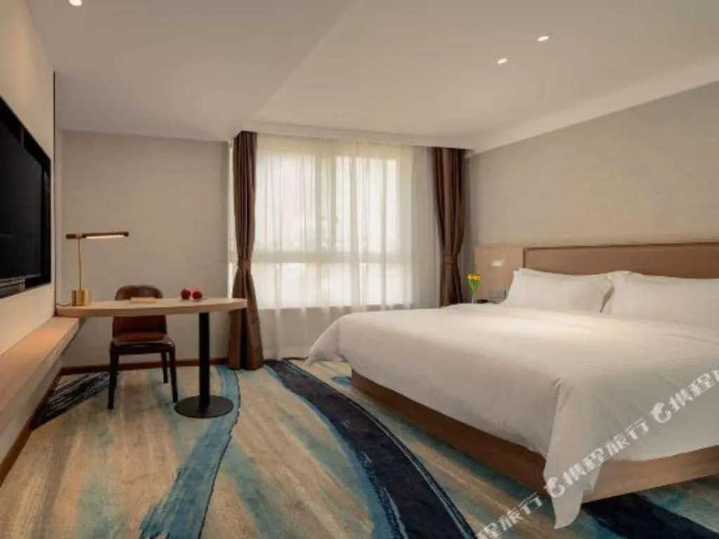 Bed in GreenTree Inn Ganzhou Sankang Temple DaRunFa Express Hotel